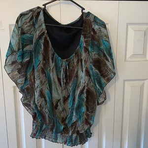 Neutral colored size L short sleeve shirt. Great condition.